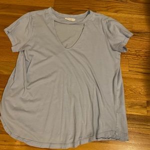 Short sleeve top with a triangle opening in front